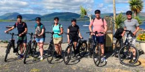 Group of cyclists riding e-bikes on the Isle of Bute