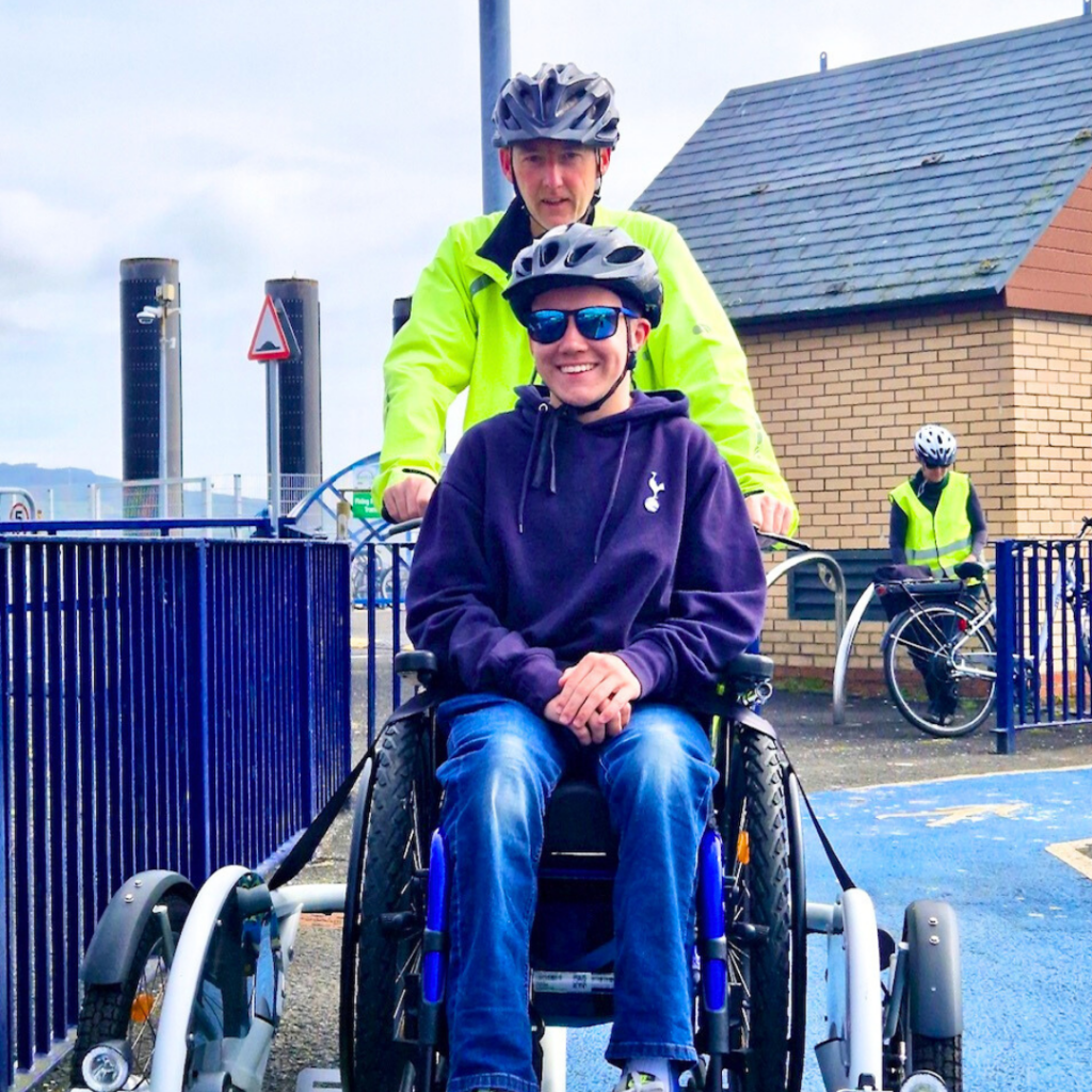 Wheelchair accessible bike being used on the Isle of Bute