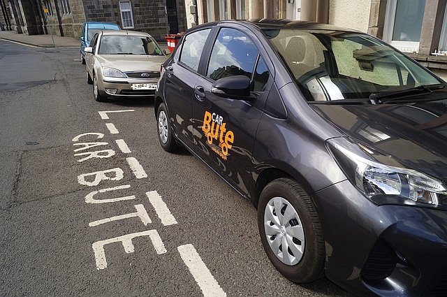Electric cars buzzing around on Bute